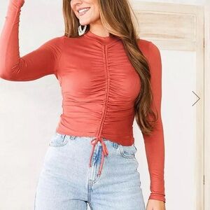 Burnt orange long sleeve top
